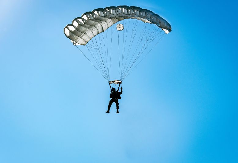 High altitude penetrator parachute systems